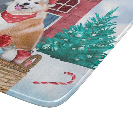 雪の中の秋田犬のクリスマスドッグハウス カッティングボード (角)