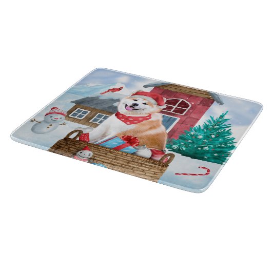 雪の中の秋田犬のクリスマスドッグハウス カッティングボード (角)