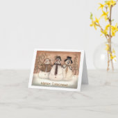 雪の中の3体のヴィンテージの雪だるま カード (黄色い花)