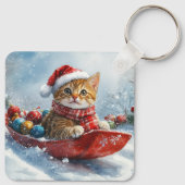 雪の中を歩くアビシニアン猫 キーホルダー (裏面)