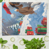 雪の中を走るカネ・コルソ（クリスマス帽子をかぶって） キッチンタオル (折り畳み)