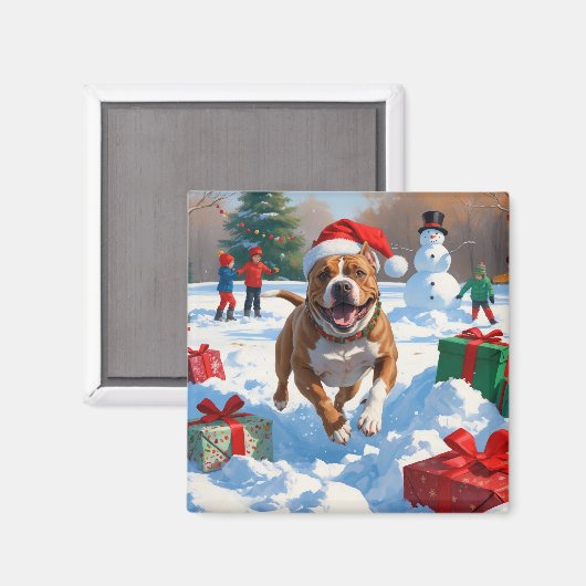 雪の中を走るクリスマス帽のピットブル犬 マグネット (正面/裏面)