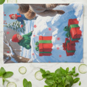 雪の中を走るクリスマス帽のプードル キッチンタオル (折り畳み)