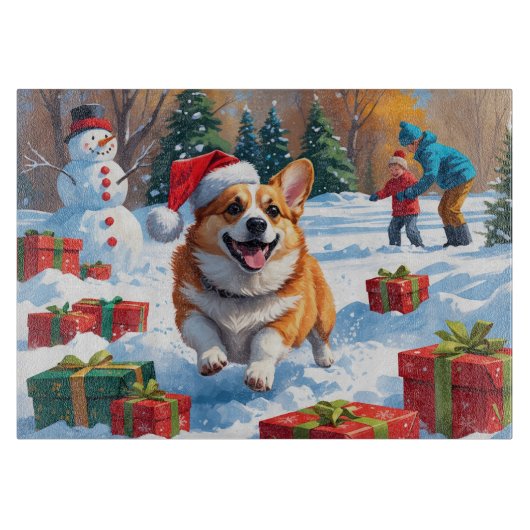 雪の中を走るコーギーとクリスマス帽 カッティングボード (正面)