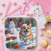 雪の中を走るコーギーとクリスマス帽 ペーパープレート (パーティー)