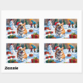 雪の中を走るコーギーとクリスマス帽 長方形シール (シート)