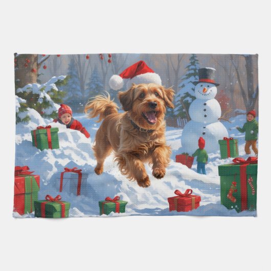 雪の中を走るハバニーズのクリスマス帽 キッチンタオル (横)