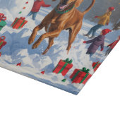 雪の中を走るビズラ（クリスマス帽子） カッティングボード (角)