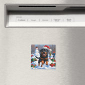 雪の中を走るロットワイラー クリスマス帽子をかぶって マグネット (インサイチュ (食洗機))