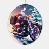 雪の中、バイクに乗ったサンタ セラミックオーナメント (左)