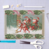 雪の入った爪先で掃く赤いクリスマス小妖精や小人 薄葉紙 (クラフト)