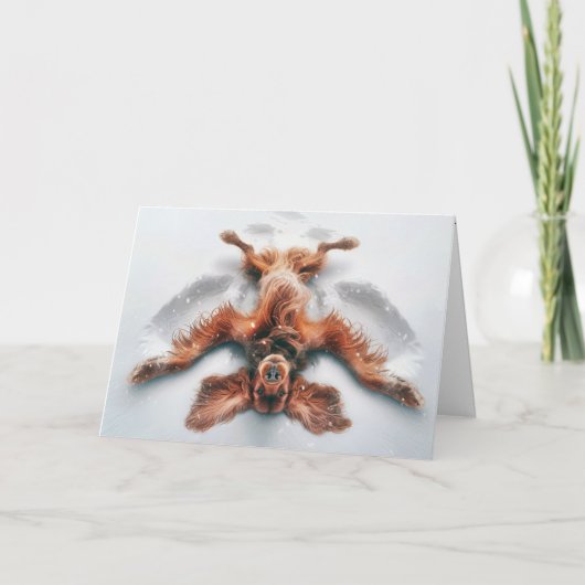 雪の天使を作るクリスマス・アイリッシュ・セッター シーズンカード (正面)