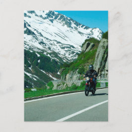 雪の山の写真にバイクのライダー ポストカード