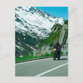 雪の山の写真にバイクのライダー ポストカード