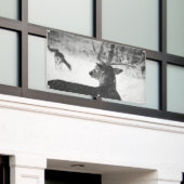 雪の旗にグロメットを入れた鹿 横断幕 (ビルの外側)