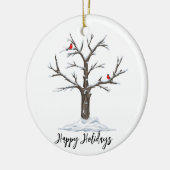 雪の木の上の冬の赤い深紅色 セラミックオーナメント (左)