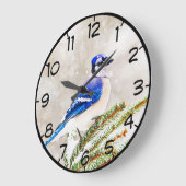 雪の松の木の中の青いカケス ラージ壁時計 (傾斜)