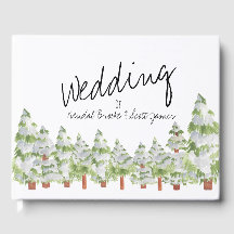 雪の松の木の冬の結婚式のゲストブック