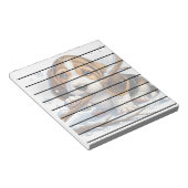 雪の棒を持ったかわいい子犬 ノートパッド (アングル)