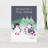 雪の森の中で可愛いペンギンがメリークリスマス シーズンカード (正面)