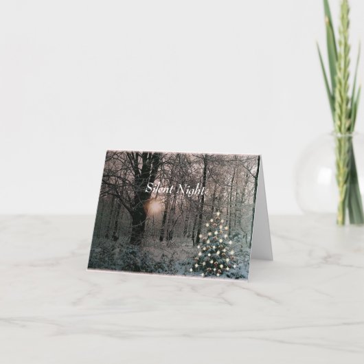 雪の森の中のライトツリー休日グリーティングカード シーズンカード (正面)