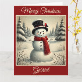 雪の森の中の陽気な雪だるまと赤い鳥 カード (黄色い花)