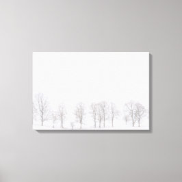 雪の白い世界のキャンバスで冬の不毛の木 キャンバスプリント