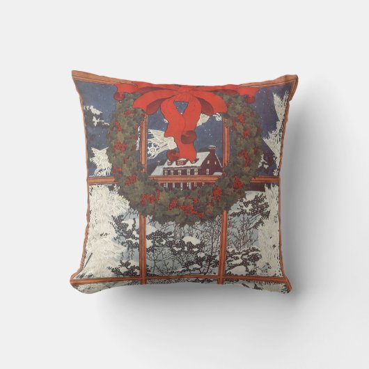 雪の窓辺にハンギングされたビンテージクリスマスリース クッション (正面)