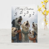 雪の結晶の中のクリスマス・キャロルの犬たち カード (黄色い花)