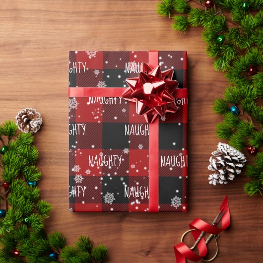 雪の結晶の中のクリスマス NAUGHTY テキスト ラッピングペーパー (クリスマスギフト)