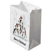 雪の結晶を使ったクリスマスペンギンのパターン ミディアムペーパーバッグ (正面アングル)