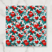 雪の赤いクリスマスハートとホリー