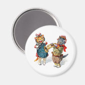 雪の遊中のラッパと三角形のかわいい猫 マグネット (正面/裏面)