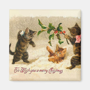 雪の遊中の猫のクリスマス マグネット