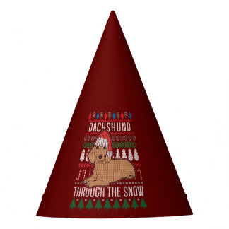 雪の醜いクリスマスセーターを通ってダックスシュント パーティーハット
