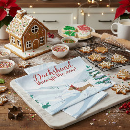 雪の降るクリスマスハンドタオルを通るダックスフント キッチンタオル