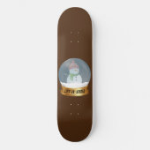 雪の雪だるまをおもしろい世界に向ける スケートボード (正面)