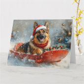 雪の雪の中のドイツの羊飼い犬 カード (黄色い花)