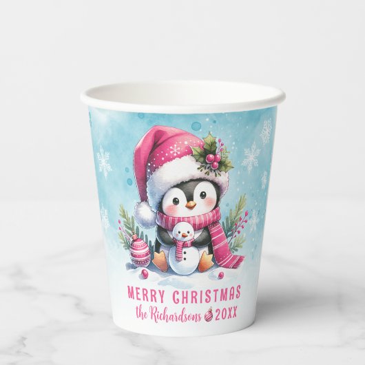 雪の青とピンクの可愛いペンギンのメリークリスマス 紙コップ (裏面)