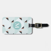 雪よくはしゃぐ模様のペンギン ラゲッジタグ (正面横)