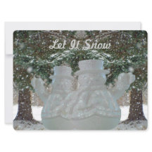 雪を振る雪だるま