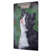 雪を調べているタキシード猫はパステル調の芸術に油をさします クリップボード (左)