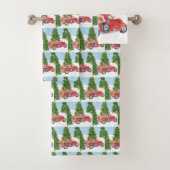 雪を通って行く古く赤い小型トラック バスタオルセット (インサイチュ)