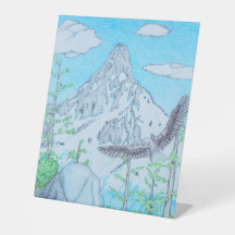 雪を頂いた山と鷲