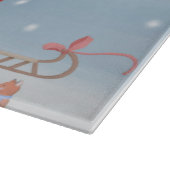 雪フランスのの中のブルドッグとクリスマスプレゼント カッティングボード (角)