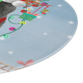 雪フランスのの中のブルドッグとクリスマスプレゼント カッティングボード (角)