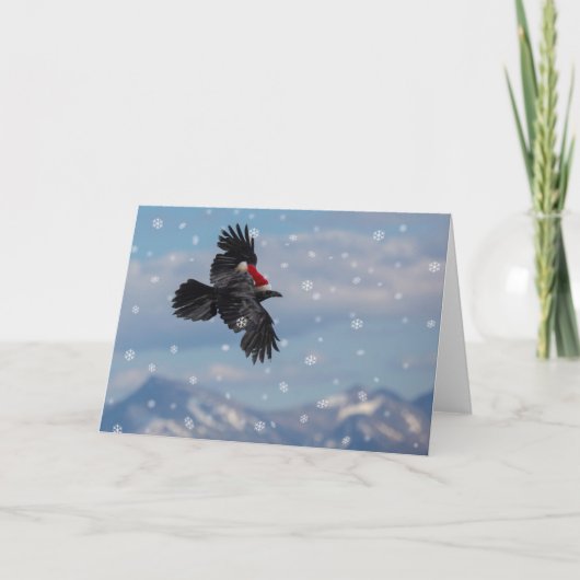 雪山を舞うクリスマスの黒い鳥 カード (正面)