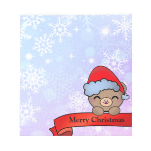 雪片がついたかわいいクリスマステディベア ノートパッド