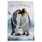 雪片に入ったクリスマスペンギン ミディアムペーパーバッグ (正面)