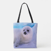 雪片に覆われた小さなハープのアザラシ トートバッグ (裏面)